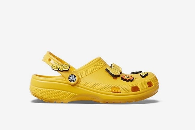 blue and yellow mismatched crocs